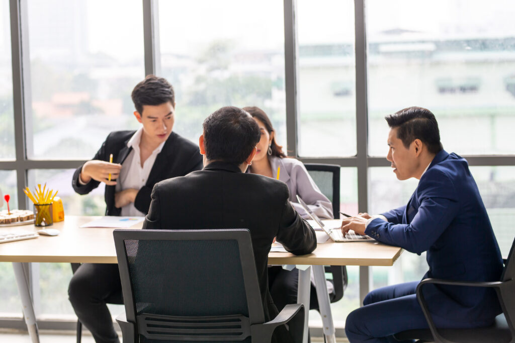 collaborative meeting at table in office